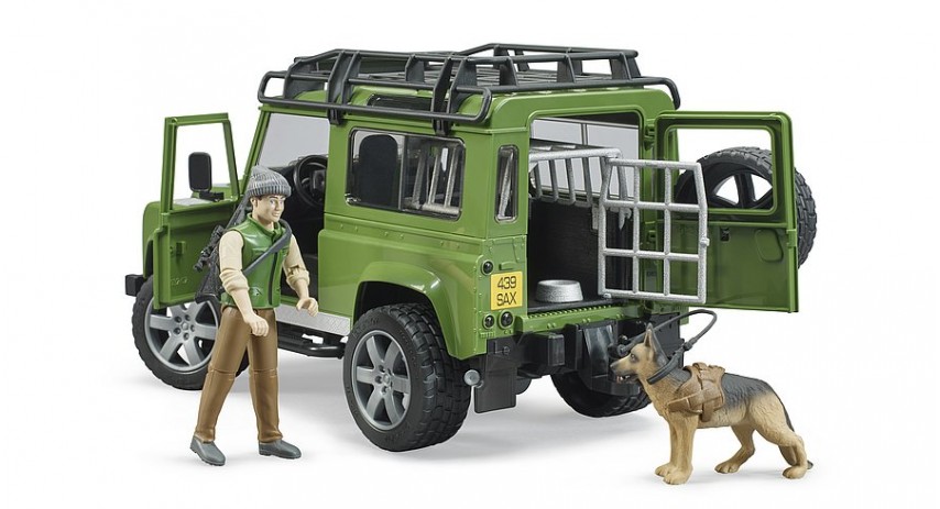 Land Rover Defender w forester and dog